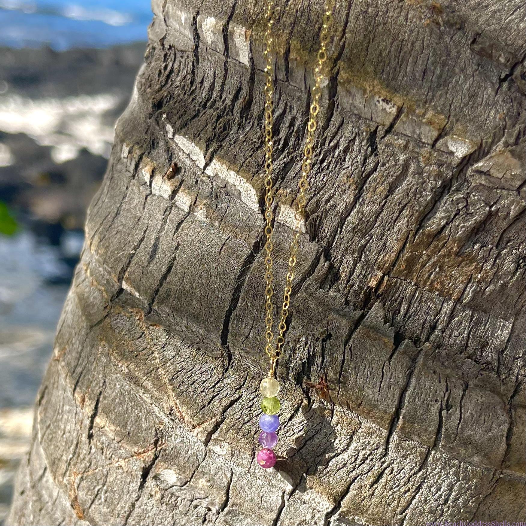 Five gemstones in a rainbow drop set in 14k gold filled dainty chain. A treasure for all ages.