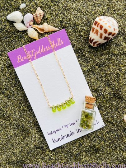 Bright green faceted peridot briolette bar necklace on 14k gold-filled dainty chain with 14k gold-filled beads. Made in Hawaii with love.