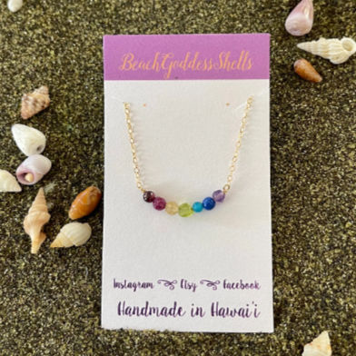 Rainbow gemstone bar necklace set on 14k gold-filled dainty chain with 7 colorful gems.